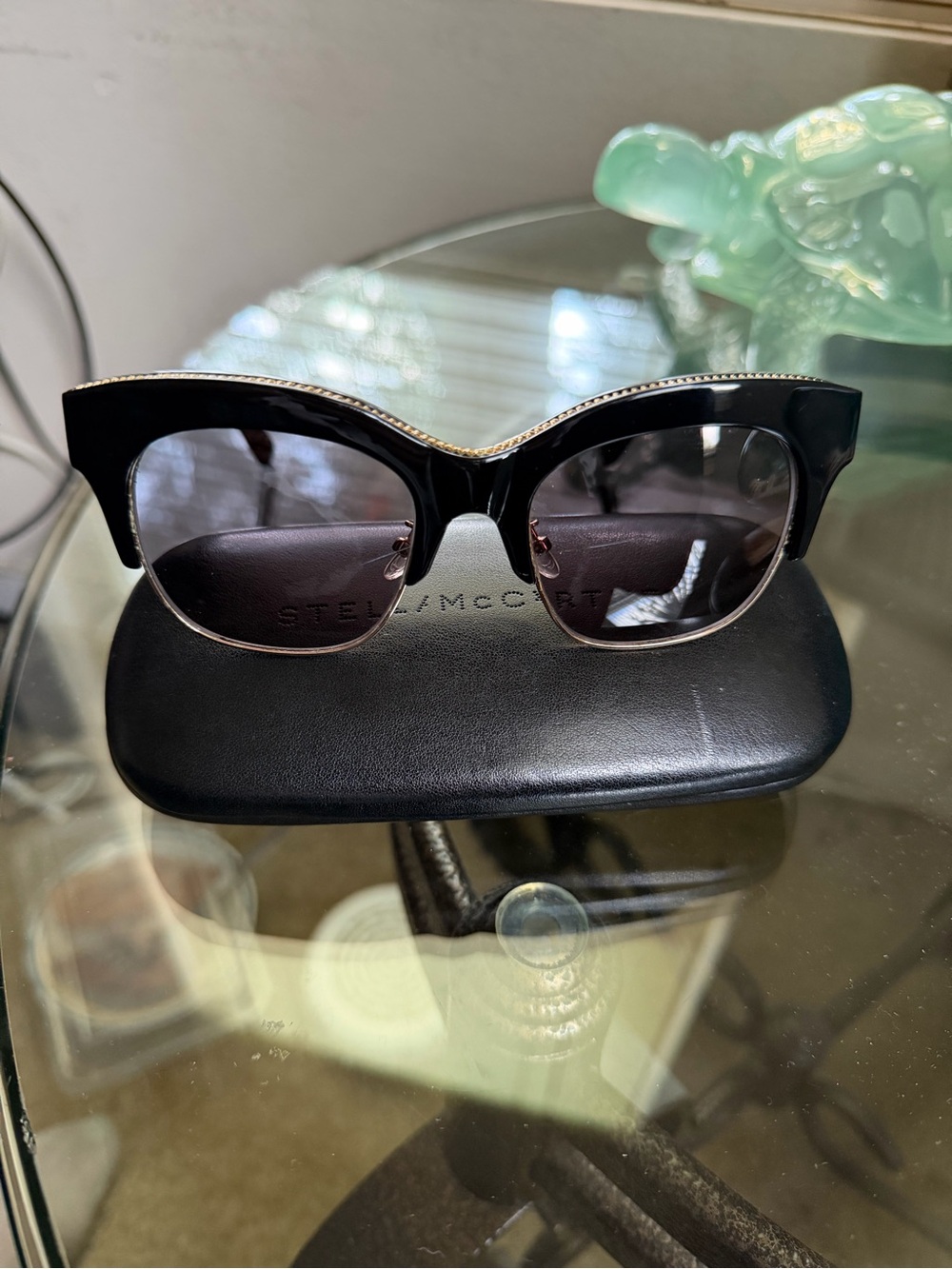 Stella McCartney Black Cat-Eye Sunglasses with Gold Trim